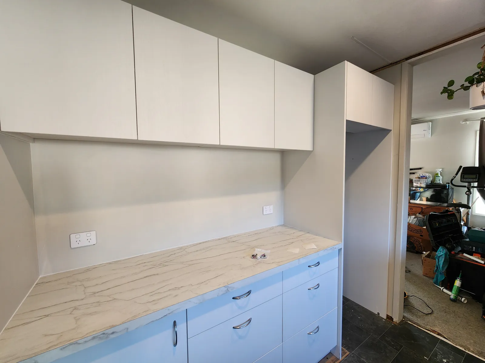Kitchen with Marble Benchtop & Overhead Cabinets