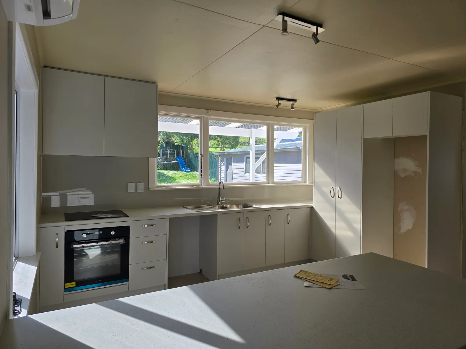 Galley Kitchen with Garden Window