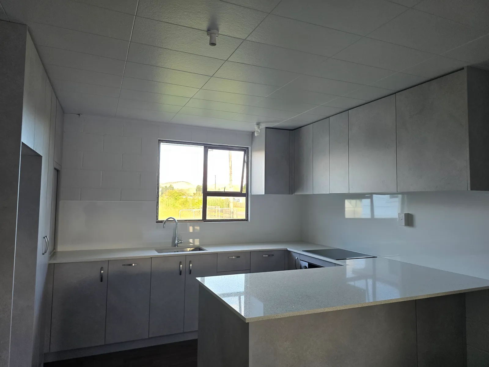 Grey U-Shaped Kitchen with Island