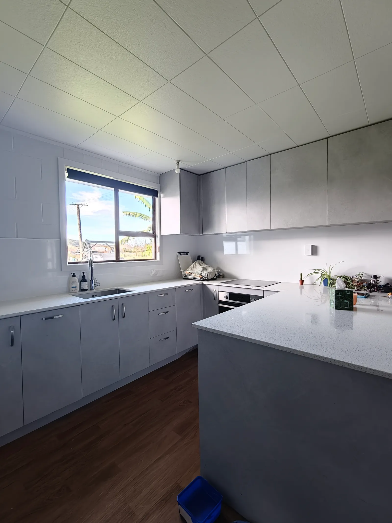 Grey Kitchen with Stone Peninsula